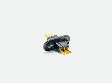 Black and gold electrical plug on a white background