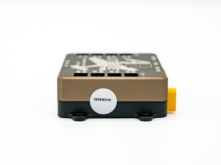 Small electronic device with a label on a white background