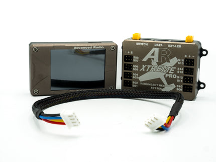 Two electronic devices with a screen and wiring on a white background