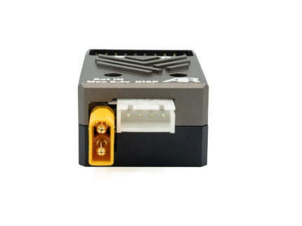 Black electronic module with a yellow connector on a white background