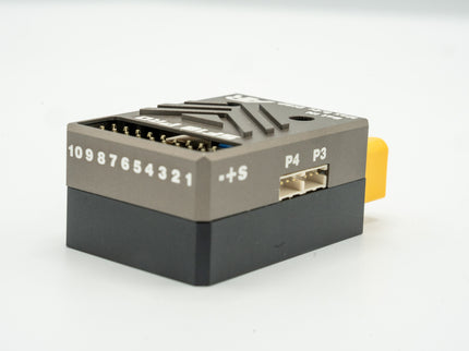 Electronic device with ports and labels on a white background