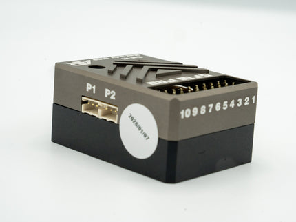 Black electronic device with ports and numbers on a white background