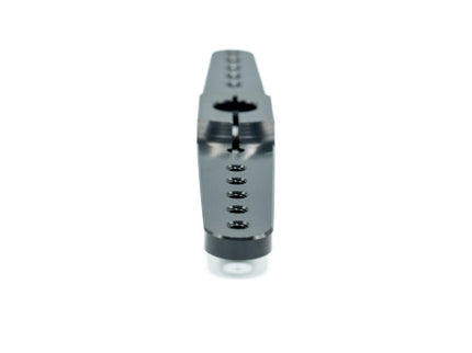 Metallic cylindrical object with a textured surface on a white background