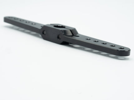 Black metal arm or bracket on a white background