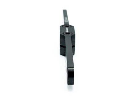 Black metal tool or component on a white background