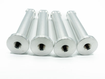Five silver metal bolts on a white background