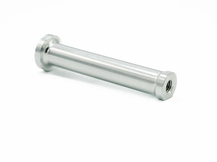 Metallic cylindrical object on a white background
