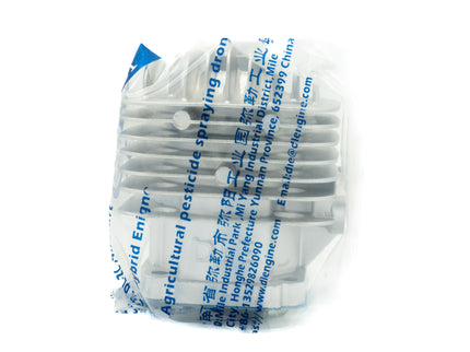 DLE 30CC Cylinder Head in plastic bag on white background
