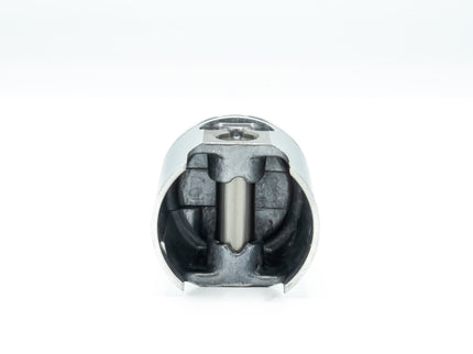 Close-up of a cylindrical metal object on a white background