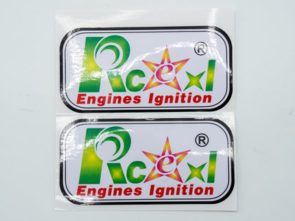 Two 'Pecxi Engines Ignition' stickers on a white background