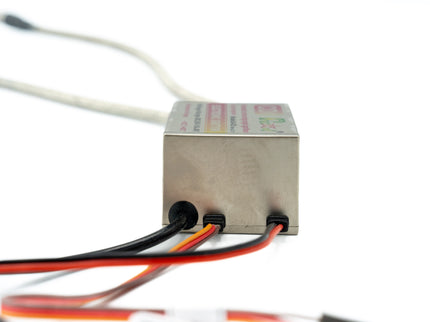 Small electronic component with wires on a white background