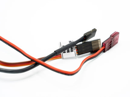 Electrical connector with red and black wires on a white background