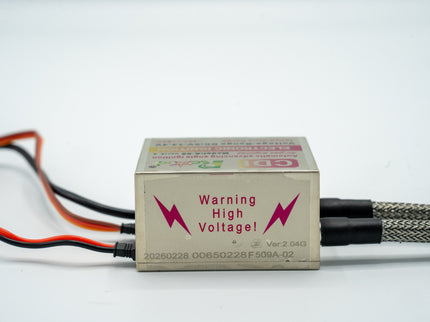 Electronic component with 'Warning High Voltage' label on a white background
