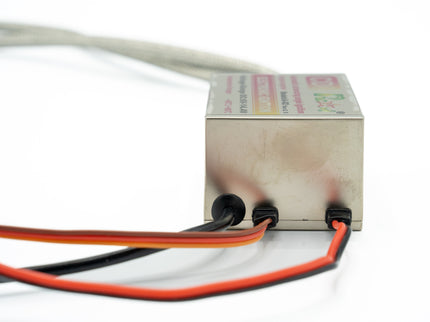 Small electronic device with wires on a white background