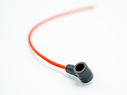 Red cable with black connector on a white background