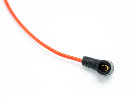 Red cable with black connector on a white background
