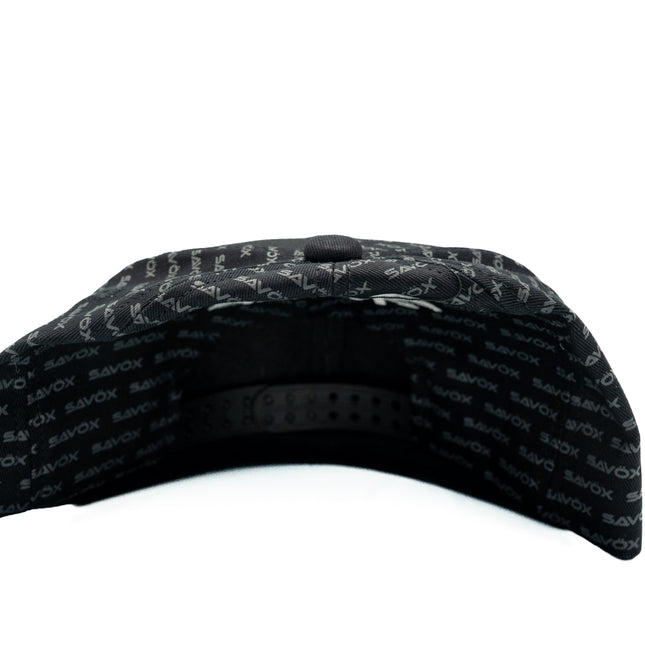 Black cap with text pattern on a white background