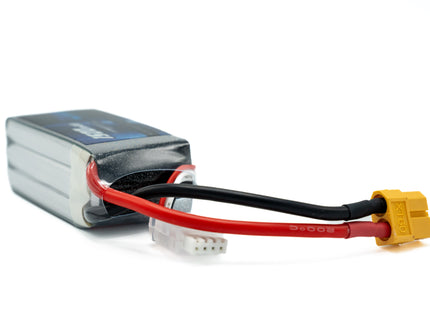 Lithium polymer battery with red and black connectors on a white background