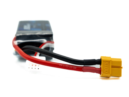 Battery connector with red and black wires on a white background