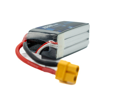 Small battery with red and yellow connectors on a white background