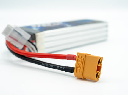 Battery connector with red and black cable on a white background