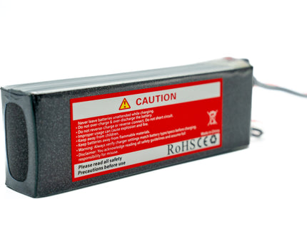 Rectangular battery pack with warning label on a white background