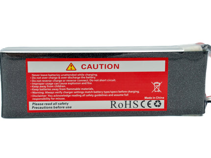 Battery pack with a red warning label on a white background