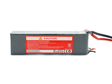 Battery with a red label and warning text on a white background