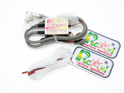 Engine ignition system with cables and connectors on a white background