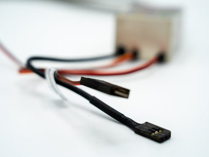 Close-up of electronic connectors with wires on a blurred background