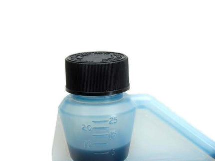 Blue container with black lid on a white background