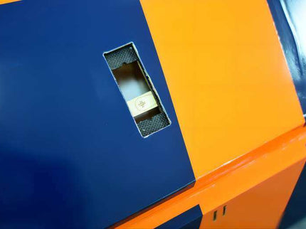 Close-up of a blue and orange object with a textured area.