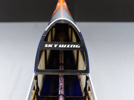 Close-up of fuselage with 'SKY WING' branding on a gray background