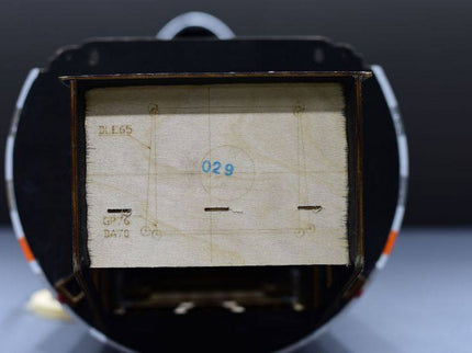 Close-up of firewall component with engraved text on a dark background