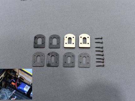 Set of brackets and screws on a gray background