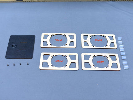 Set of exxhaust mounts and components on a blue surface