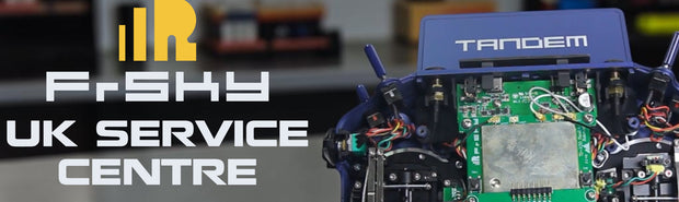 Promotional graphic for FrShy UK Service Centre featuring a close-up of a blue and green electronic control unit labeled 'TANDEM' against a blurred workshop background.