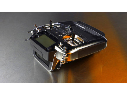 Futaba T26SZ Pro 26‑Channel Air Radio with digital display on a reflective surface
