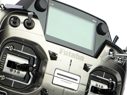 Close-up of aFutaba T26SZ Pro 26‑Channel Air Radio with a screen and buttons on a white background