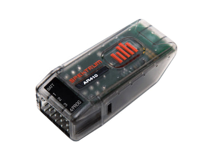 Spectrum RC receiver on a white background