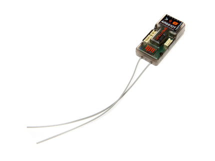 Small electronic device with wires on a white background