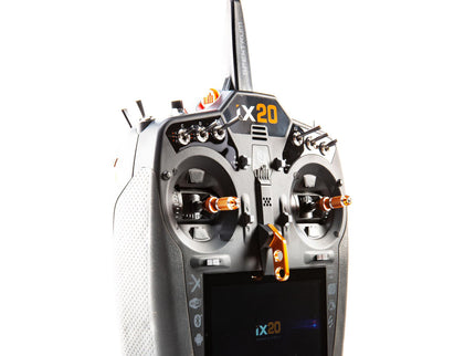 Close-up of a radio control transmitter with 'iX20' branding on a white background