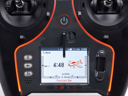 Close-up of a drone remote control with display screen and buttons