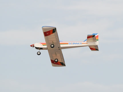 Phoenix Model PH006-SCANNER 57" airplane flying in the sky with 'Scanner' branding.