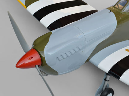 Phoenix Model Spitfire 61" ARF V2 with Electric Retracts Close-up of a model airplane with a propeller on a gray background