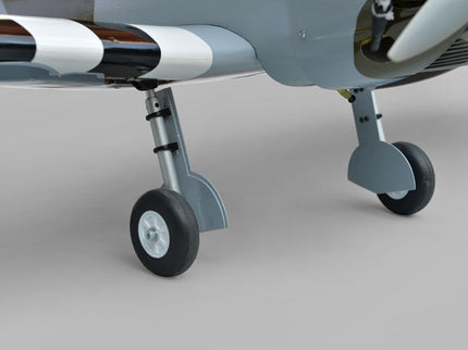 Phoenix Model Spitfire 61" ARF V2 with Electric Retracts Close-up of an airplane's landing gear on a neutral background