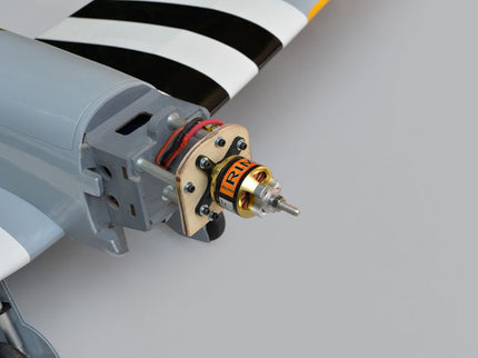 Phoenix Model Spitfire 61" ARF V2 with Electric Retracts  Close-up of a model airplane propeller and motor on a gray background
