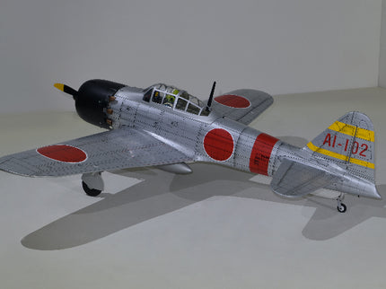 Phoenix Model ZERO A6M Model airplane with red and yellow markings on a white background