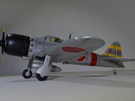 Phoenix Model ZERO A6M Model airplane with propeller on a gray background