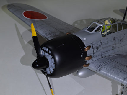 Phoenix Model ZERO A6M Model airplane with propeller on a white background